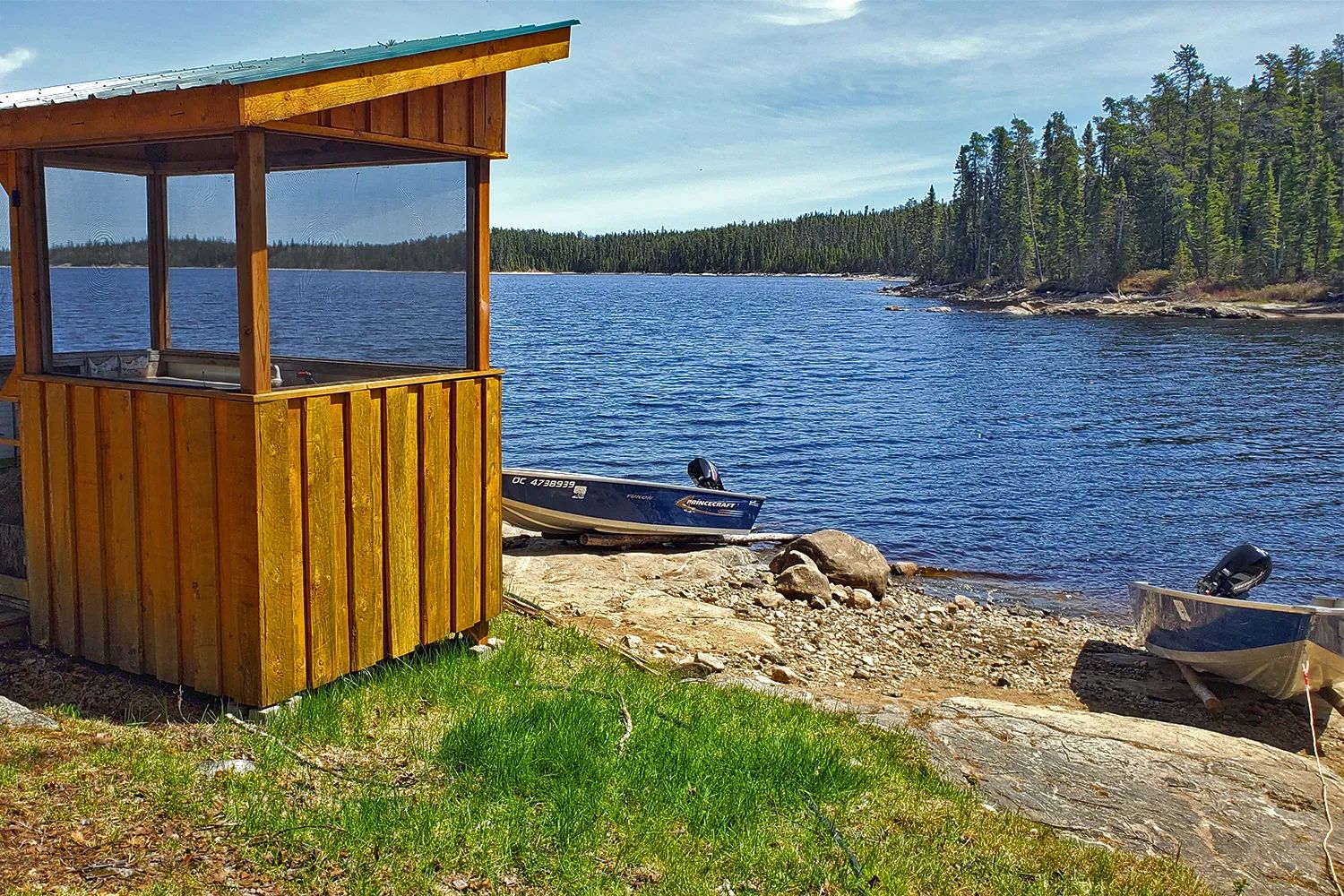 View of the lake from the outdoor shelter near the cabin.