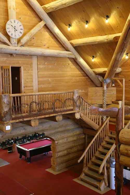 Mezzanine view of the lodge's lounge area with a pool table.