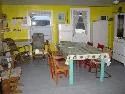 This common area of the cabin features a dining table and chairs arranged for meals.