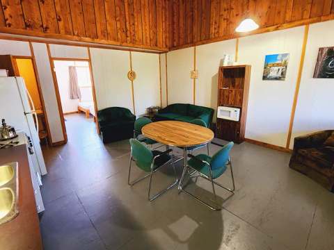 View of the open concept area featuring the kitchen, dining room, and living room of Suite A.