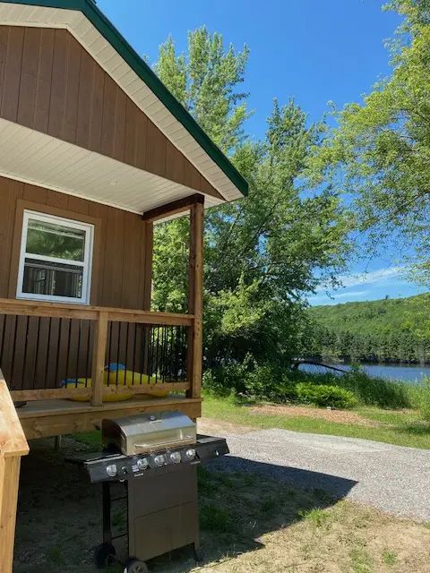 A barbecue is available for your use on the cottage deck overlooking the lake and forest.