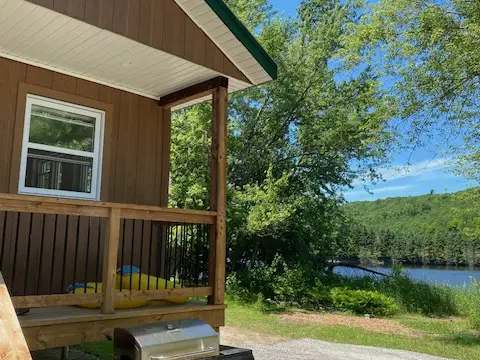A barbecue is available for your use on the cottage deck overlooking the lake and forest.