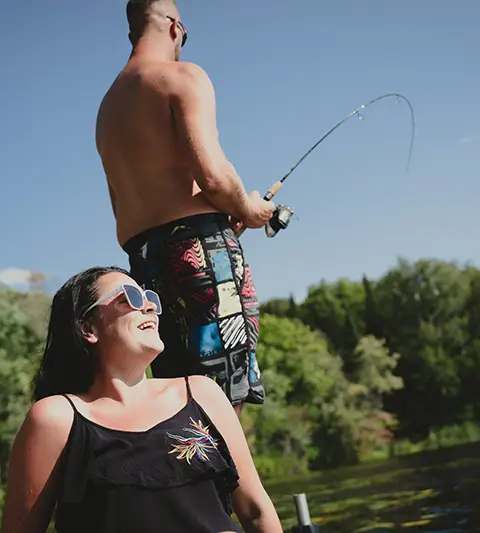 Angler out on a lake excursion at Escapade Kiamika, Laurentides, Quebec