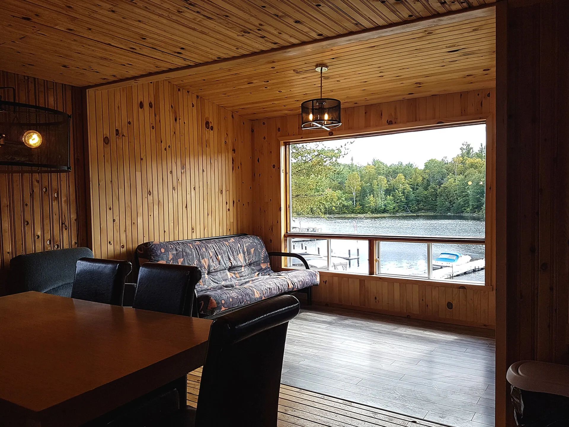 Living and dining area with a view of the lake from the King cabin.
