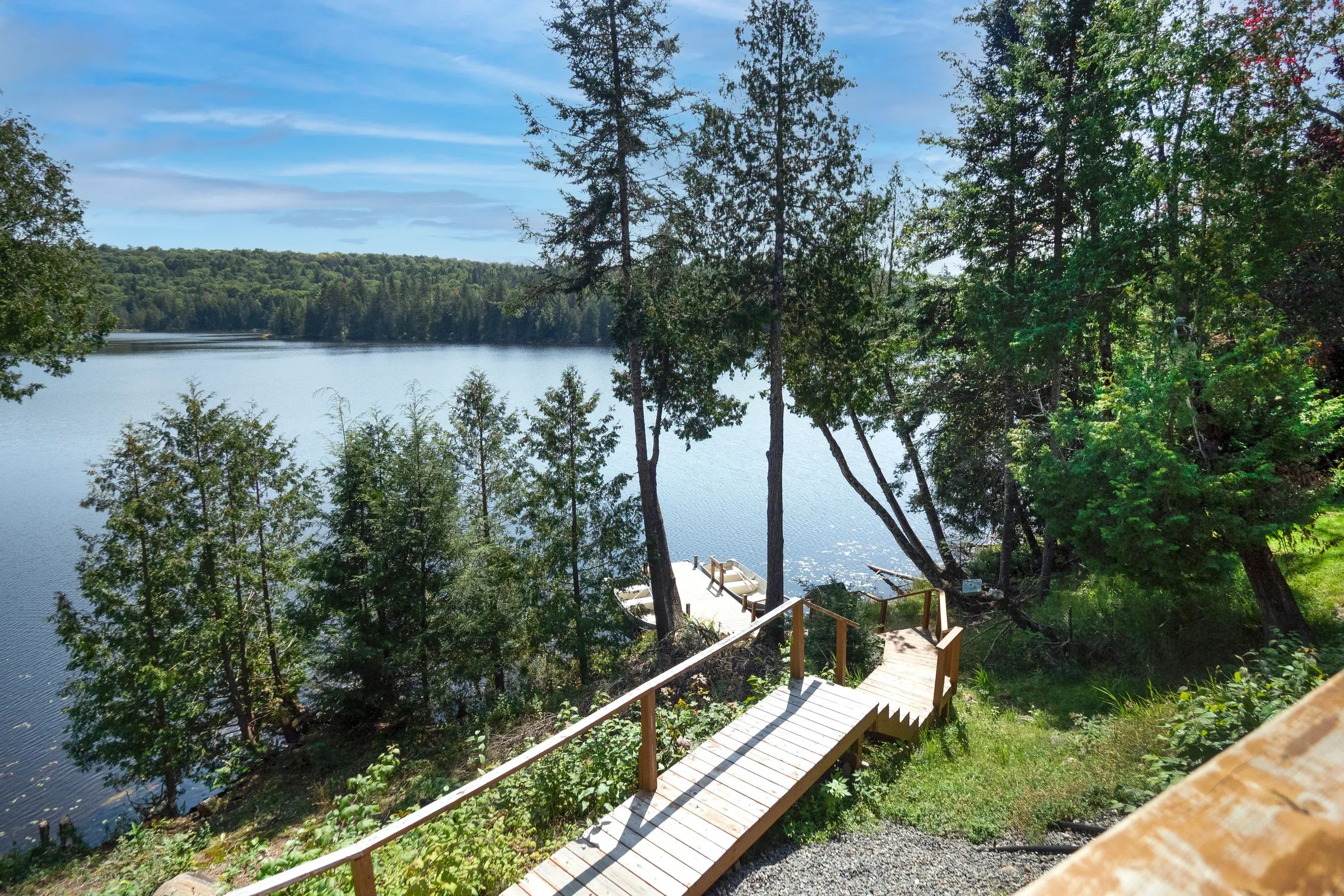 Overlooking view of the lake from the exterior stairs leading to the cottage dock.