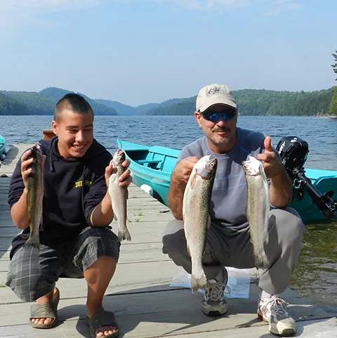Fishing Rainbow trout at Pourvoiriela Reserve Boismenu, Laurentides, Quebec
