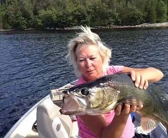Fishing Northern pike at Pourvoirie Cabonga, Outaouais, Quebec