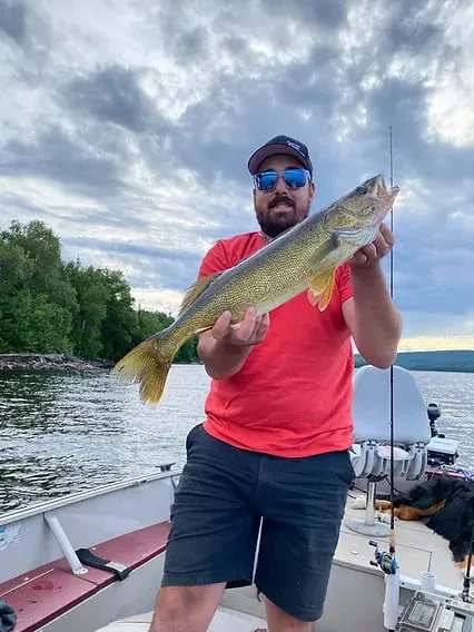 Boat fishing on Lac Piscatosine at Pourvoirie Club Fontbrune, Laurentides, Quebec