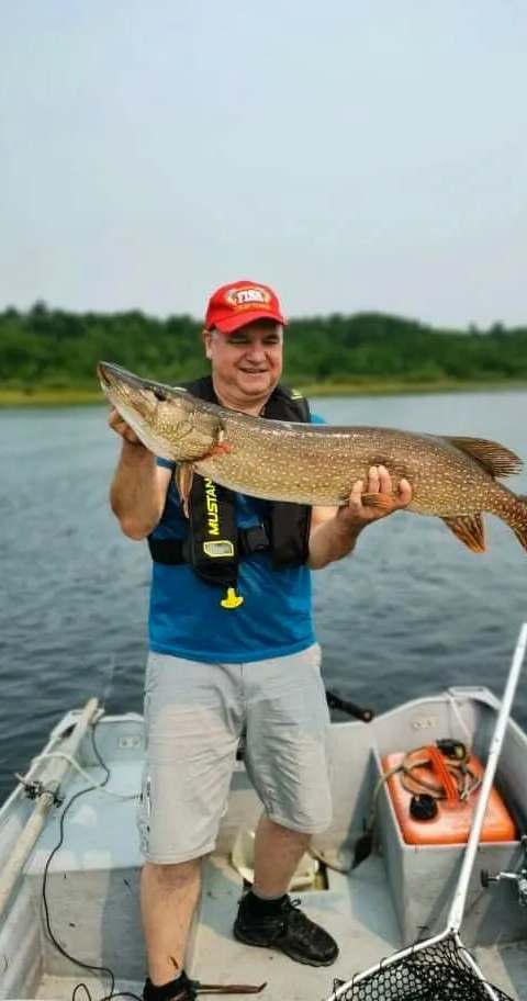 Fishing Northern pike at Pourvoirie Club Fontbrune, Laurentides, Quebec