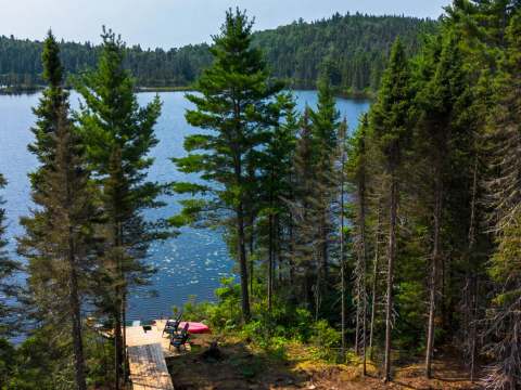 Overhead view of the private dock and the lake from the cabin's deck.