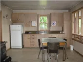 View of the cottage kitchen and dining area.