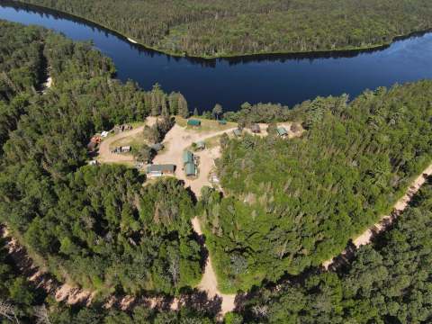 Aerial view of the cabins located along the river.