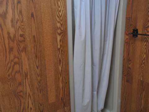 The shower stall is installed in the cabin's bathroom.