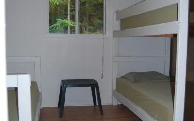 This bedroom at Chalet Alain is equipped with bunk beds.