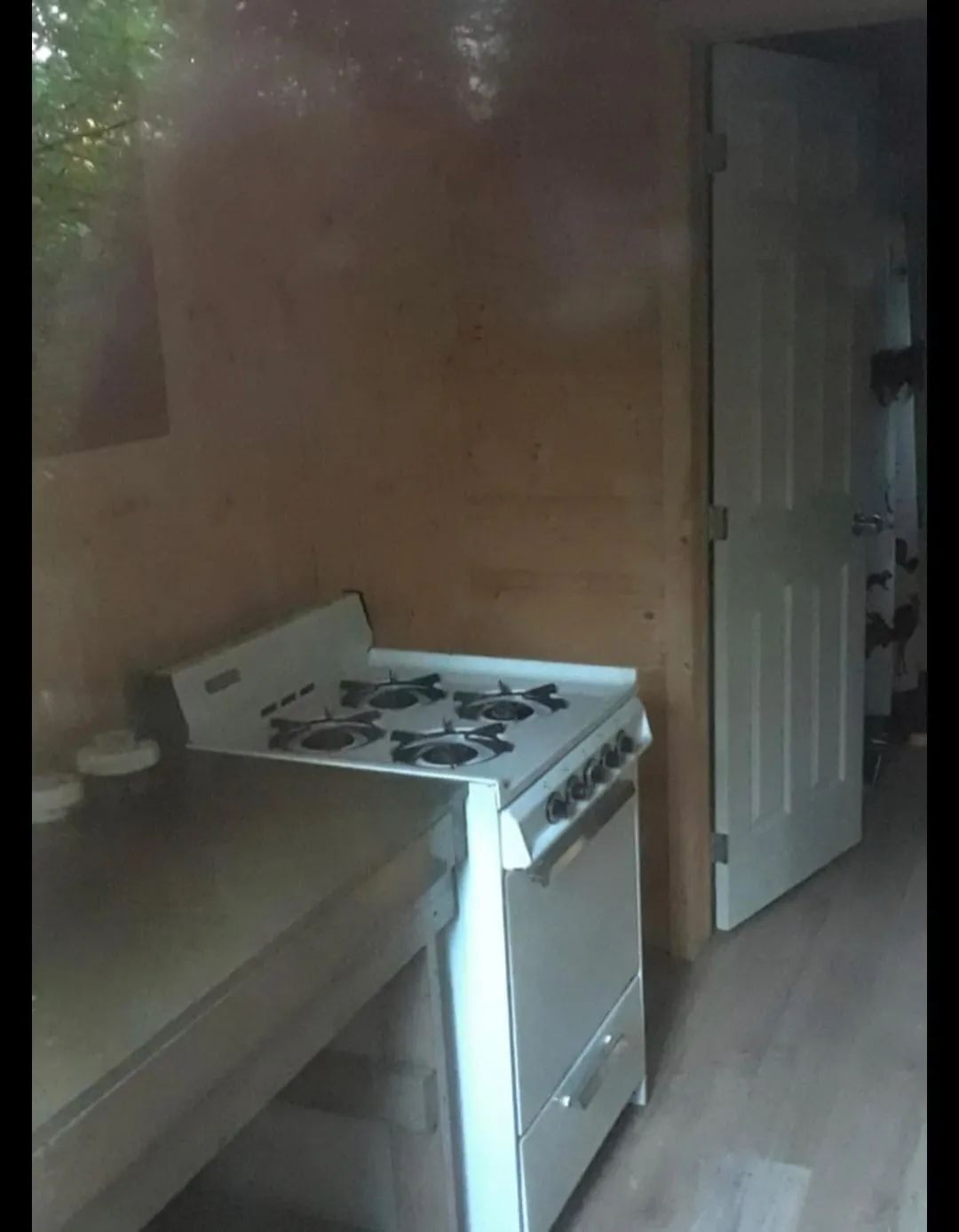 The stove is installed in the cabin's kitchen area.