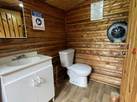 Interior view of the functional bathroom in our log cabin.