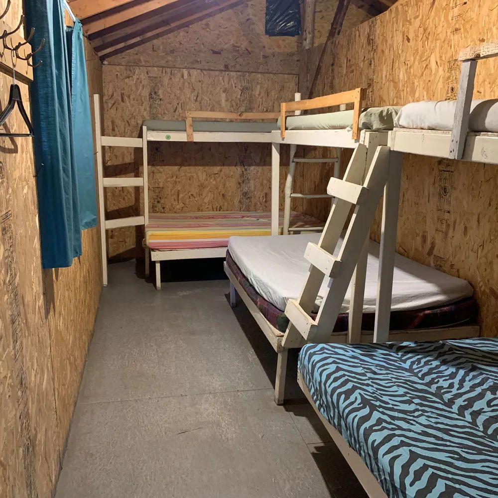 Interior view of the cabin bedroom equipped with bunk beds.