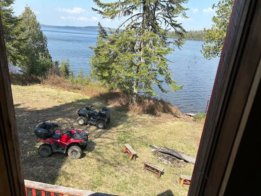View of the grounds and the lake from the cabin.