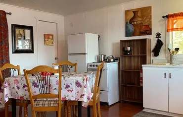 The functional kitchen and dining area of cottage number 12.