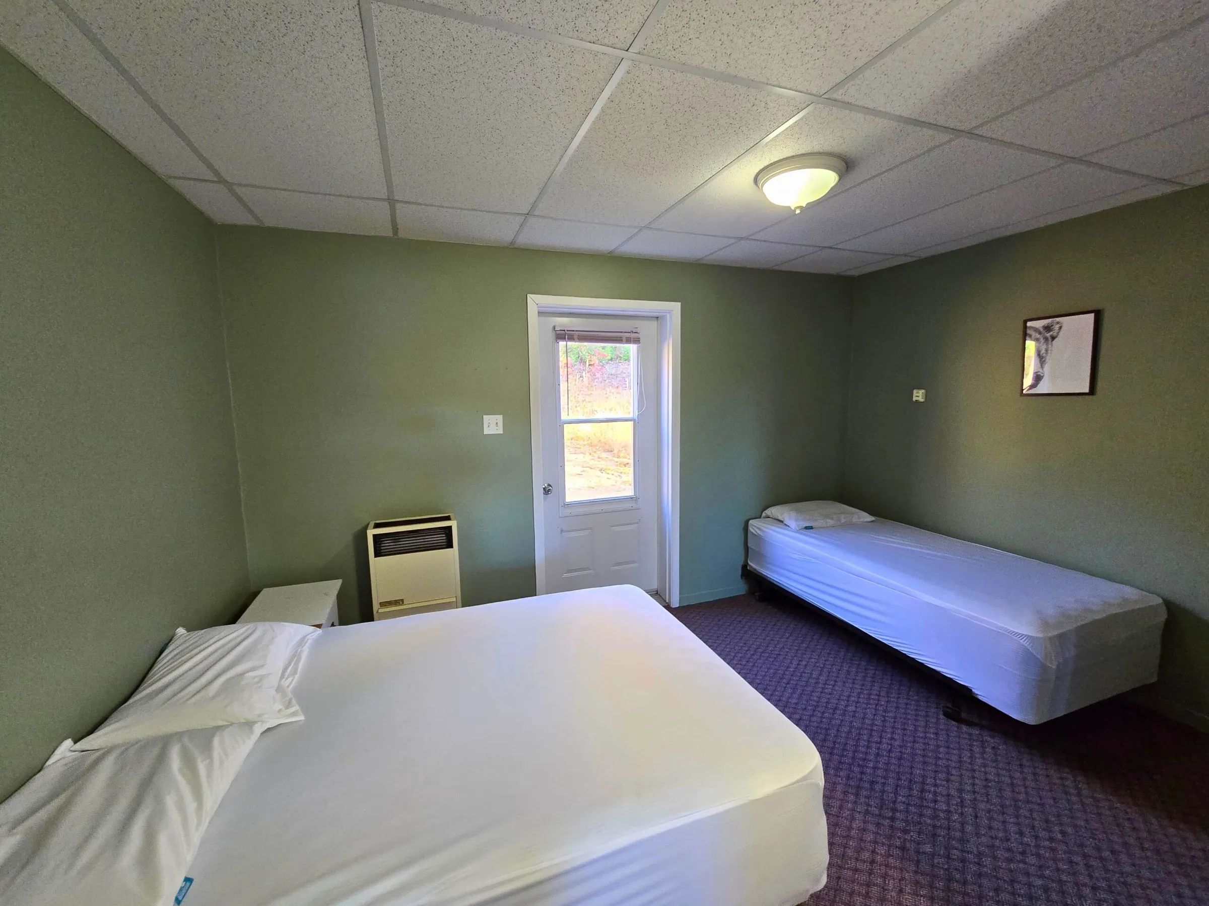 The Bear studio is equipped with one double bed and one single bed.