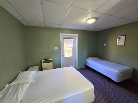 The Bear studio is equipped with one double bed and one single bed.