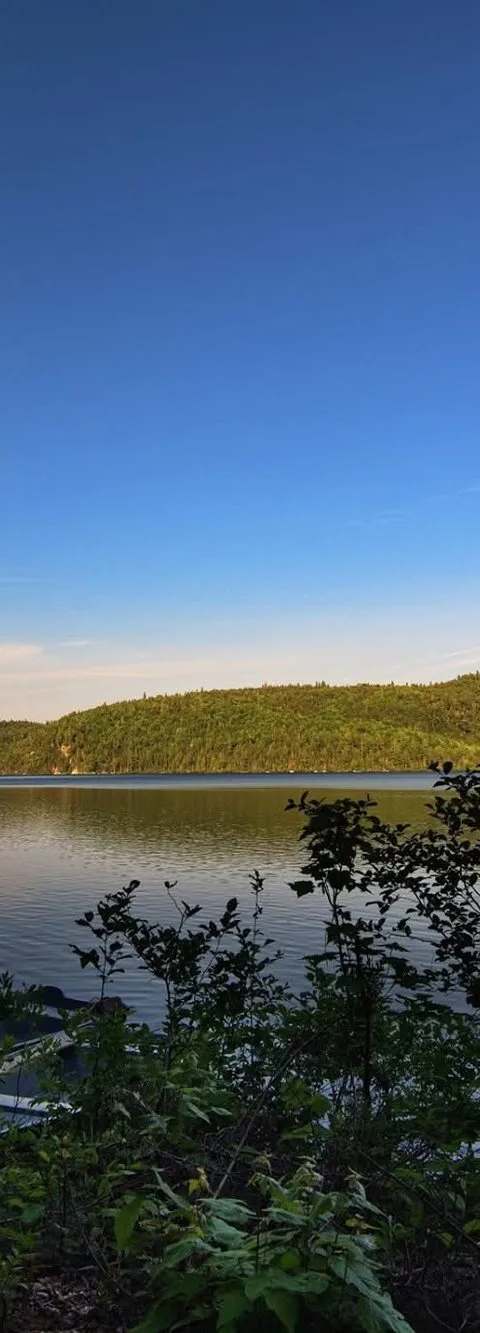 Fishing boats moored on the lake at Pourvoirie Raoul Lavoie, Charlevoix, Quebec