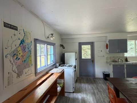 View of the kitchen and dining area in cottage 3 of the outfitter.