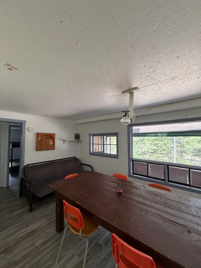 View of the dining area and living space in chalet number 6.