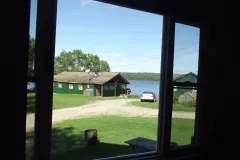 View of the outfitter grounds and the lake from the cabin window.