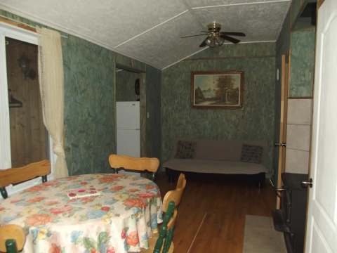 View of the dining area and living space in cabin 7.