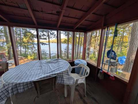 View of the lake from the covered porch of cottage 5.