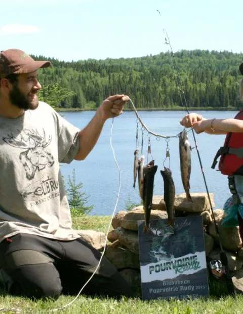Father-daughter fishing day on the lake at Pourvoirie Rudy 2015, Laurentides, Quebec