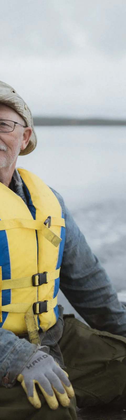 A proud moment for a fisherman on the lake at Andrew Lake Lodge, Wood Buffalo, Alberta