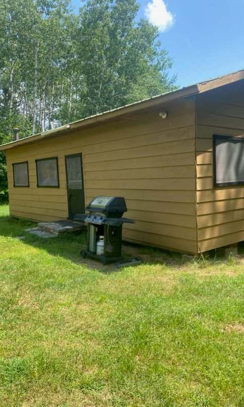 Chalet avec plage de sable privée et vue sur le lac chez Pourvoirie du Lac Forant, Outaouais, Québec
