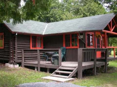 Cabin 3 features an outdoor deck and a barbecue to enjoy the outdoors.