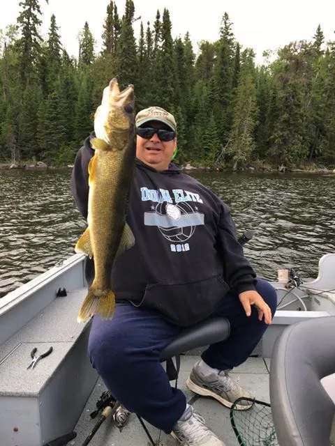 Nice walleye catch by one of the outfitter's guests at Manotak Lodge, Sunset Country, Ontario