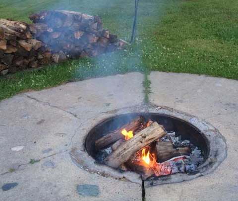 Lakeside campfire area in the evening at Manotak Lodge, Sunset Country, Ontario