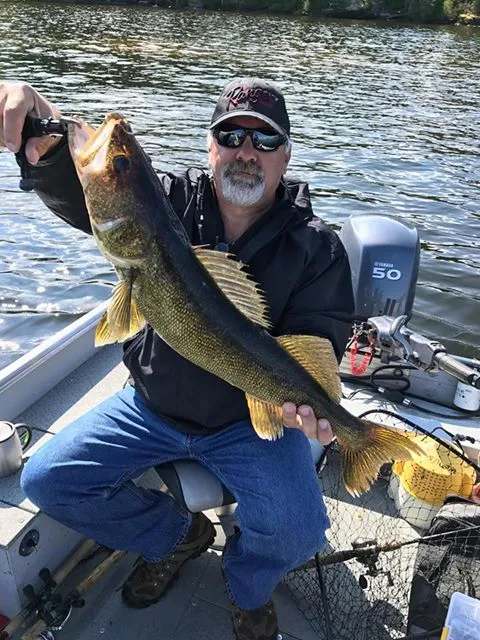 Joe proud of his catch on Perrault Lake at Manotak Lodge, Sunset Country, Ontario