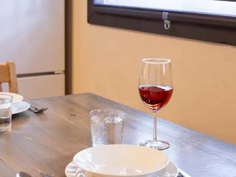 The dining table is set in the suite for your meals.