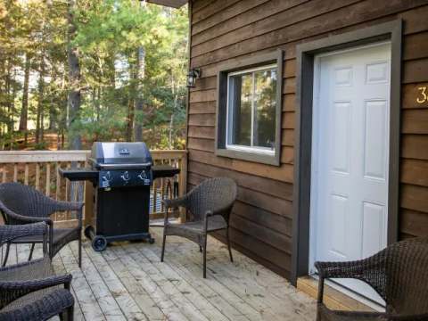 Family suite number 38 features a private deck with a barbecue and outdoor furniture.