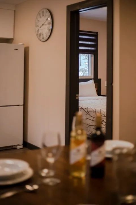 View from the dining table towards the bedroom of the family suite.