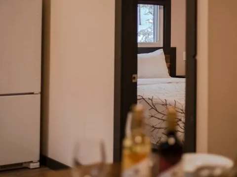 View from the dining table towards the bedroom of the family suite.