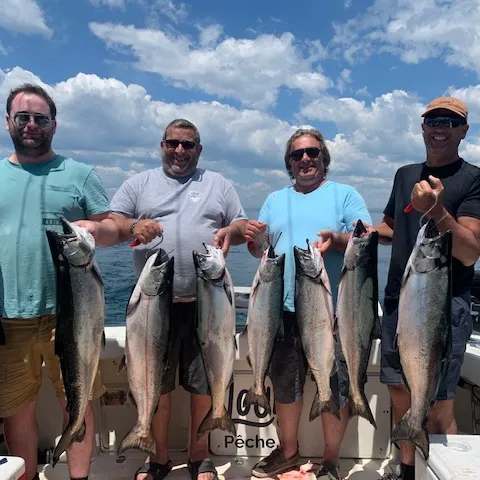 Successful guided fishing excursion on Lake Ontario at Louis Pêche, Ontario