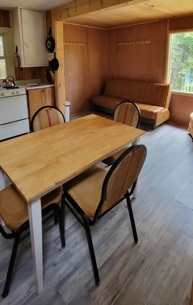 The dining area open to the living room and kitchen of the Troll cottage.