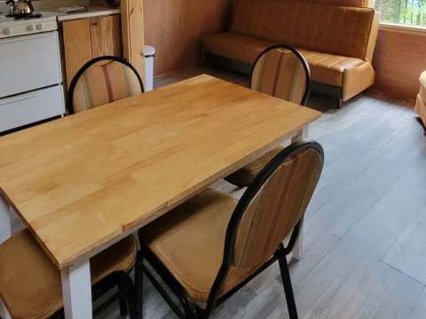 The dining area open to the living room and kitchen of the Troll cottage.